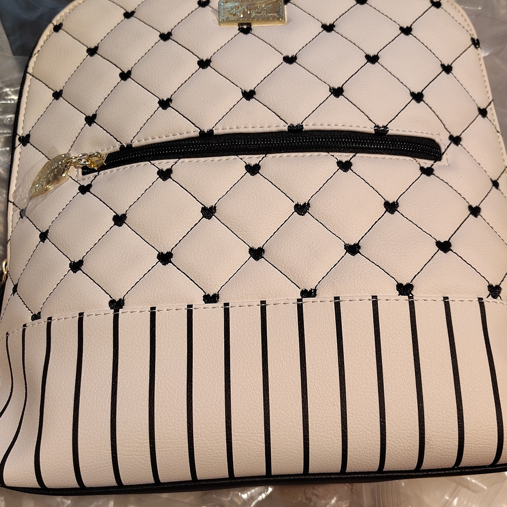 Betsey Johnson Quilted Faux Leather Backpack in Light Pink with Black Accents
